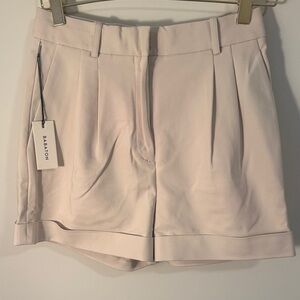 Babaton Cream High-Rise Tailored Pleated Shorts
